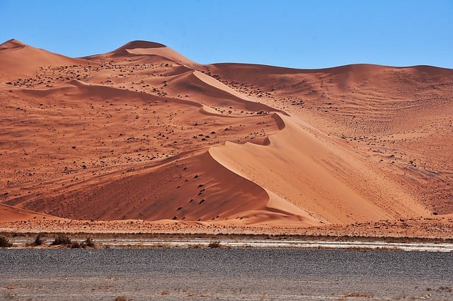 Desert Adventure: Dune Buggy Navigates Golden Sands of Dubai